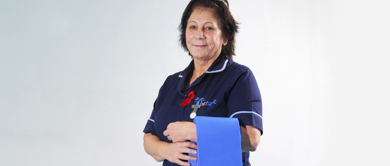nurse holding a disposable curtain